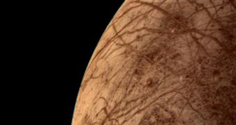 This is the Jovian moon Europa, which may contain an ocean of liquid water beneath miles of ice