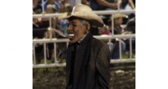Clown wearing Obama mask cheers on crowds at Missouri State Fair