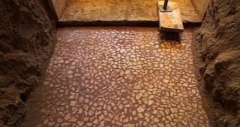 Red and white mosaic adorns the floor of the antechamber of a 4th century BC tomb in Greece