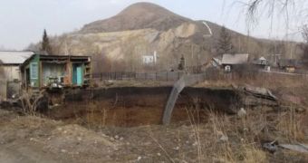 Giant hole in the ground swallows house in Kazakhstan