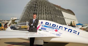 Team Lead Jack Langelaan poses for a photograph next to the Pipistrel-USA, Taurus G4, aircraft prior to winning the 2011 Green Flight Challenge