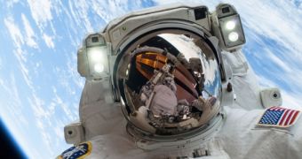 NASA astronaut Mike Hopkins during a December 24, 2013 EVA to fix Loop A of the ISS cooling system