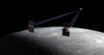 This is an artist's rendition of the twin GRAIL spacecraft in orbit around the Moon