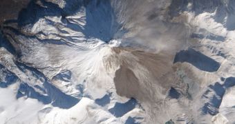 This image shows ash clouds on the slopes of Kizimen Volcano, in eastern Russia