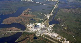 An aerial view of the Kennedy Space Center. In the background, both pads are visible, LC-39A to the left, and LC-39B