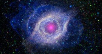 This remarkable view of the Helix Nebula was snapped by Spitzer (IR) and GALEX (UV)