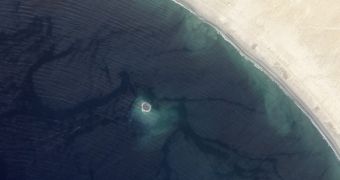 The new island appears in satellite pictures