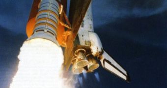 Flames coming from the shuttle's Solid Rocket Boosters