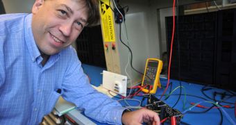 GSFC heliophysicist Doug Rowland is seen here with the engineering unit of Firestation’s interface board