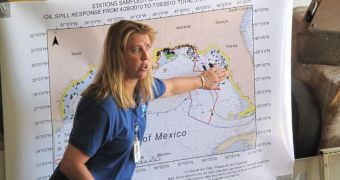 This summer 2010 image shows Dr. Lisa Desfosse, Director of the NOAA Southeast Fisheries Science Center Mississippi Laboratories, explaining where and how NOAA samples seafood