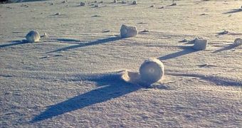 Snow rolls on a UK field