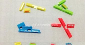 Alleged plastic iPhone parts (volume buttons)