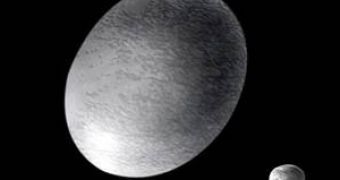 Haumea and the two satellites: Hi'iaka and Namaka. Artist impression