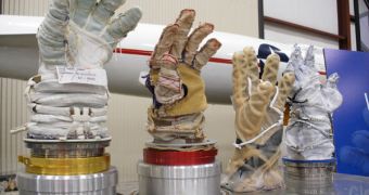 A collection of various types of spacesuit gloves