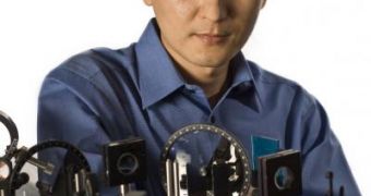 Dr. Chunlei Guo of the University of Rochester stands in front of his femtosecond laser
