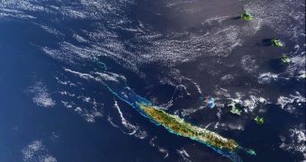 The main island of the French territory of New Caledonia, Grande Terre, is visible in the lower part of this satellite image