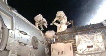 Patrick and Behnken are seen here installing ammonia hoses on the ISS' new Tranquility module