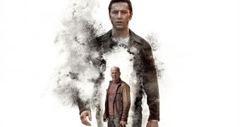New “Looper” Poster: Bruce Willis Bursts Out of Joseph Gordon-Levitt