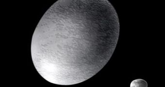 Artist's drawing depicting the dwarf planet Haumea, with its tow moons. The body has a prolonged shape that puzzles astronomers