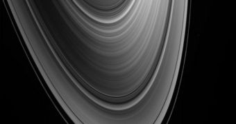 Saturn's rings may have formed when a Titan-sized planet slammed into the gas giant, early on in the history of the solar system