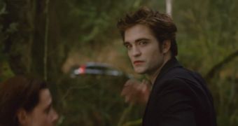 Screencap from new “New Moon” trailer showing the confrontation between Edward (Pattinson) and Jacob (Lautner), with Bella (Stewart) in the middle