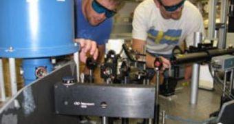 Alex High and Aaron Hammack adjust the optics in their UCSD lab