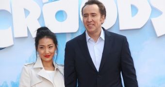 Nicolas Cage and his wife at a promo event for “The Croods”