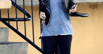 Nicole Richie leaving the gym and sporting what tabs deemed a “baby bump”