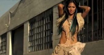 Nicole Scherzinger flaunts toned body and killer moves in video for “Right There,” ft. 50 Cent