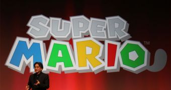 Nintendo's Satoru Iwata and the new Super Mario 3DS logo