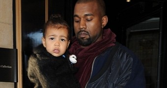 North West in leather leggings, with dad Kanye West