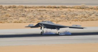 This image shows the X-47B UCAV landing, after successfully completing its first flight on February 4, 2011
