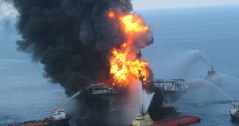 vessels battle the blazing remnants of the off shore oil rig Deepwater Horizon