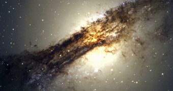 Centaurus A is hiding the spiral arms in the dense dust and gas clouds - here the center of the galaxy in visible light