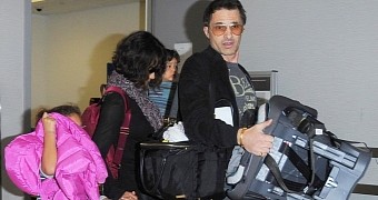Halle Berry and Olivier Martinez at LAX, right before he knocked an employee down with the baby carrier