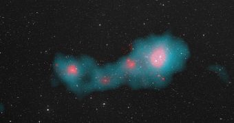 The Shapley Supercluster - microwave light from the gas between galaxies is blue, X-Ray light from the galaxies themselves is pink; the rest is visible light imagery from the Digitised Sky Survey