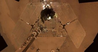 Opportunity's solar panels are covered in a thick layer of dust