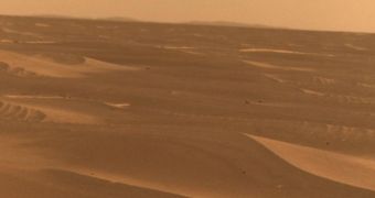 NASA's Mars Exploration Rover used its panoramic camera to record this view of the rim of a crater about 65 kilometers (40 miles) in the distance