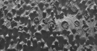 This image shows non-iron-rich spherules on a Martian rock outcrop
