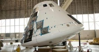 The Orion Crew Exploration Vehicle undergoes a center-of-gravity test