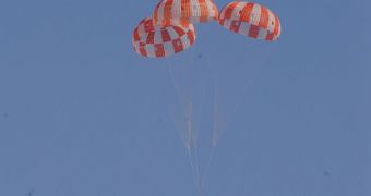 A dart-shaped Orion replica tested the spacecraft's parachute system on Tuesday, August 28, 2012