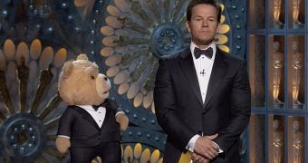 Ted, voiced by Seth MacFarlane, and Mark Wahlberg present at the Oscars 2013