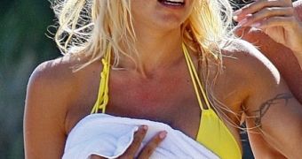 Pamela Anderson says she never wears sunscreen – and it shows, critics point out