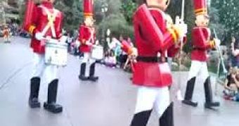 Disneyland toy soldier takes a fall, cannot get up