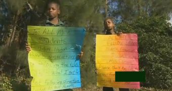 Parent Forces Children to Hold Signs, Embarrasses Them