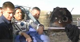 Emergency response crew take Expedition 32 astronaut Joseph M. Acaba out of the Soyuz capsule, on Monday morning