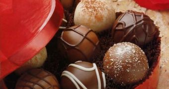 It is recommended that people keep eating chocolate and other treats while on a diet, researchers say