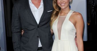 Miley Cyrus and boyfriend Liam Hemsworth on the red carpet