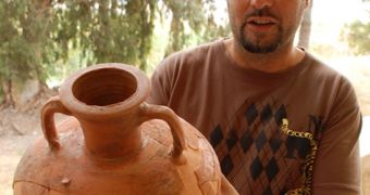 Father de Luca with a reconstructed perfume amphora