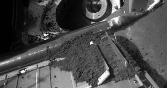Image of the test oven of the TEGA instrument during the first experiment. None of the soil on top of it seems to have passed through the screen